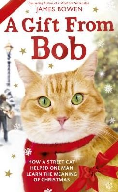Cover for James Bowen · A gift from Bob how a street cat helped one man learn the meaning of Christmas (Bog) [Large print edition. edition] (2015)