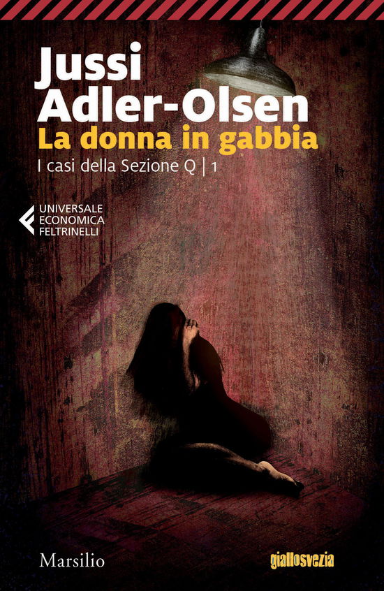 Cover for Jussi Adler-Olsen · La Donna In Gabbia. I Casi Della Sezione Q #01 (Book)