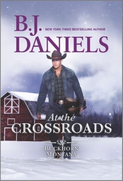 Cover for B.j. Daniels · At the Crossroads - a Buckhorn Montana Novel (Taschenbuch) (2021)