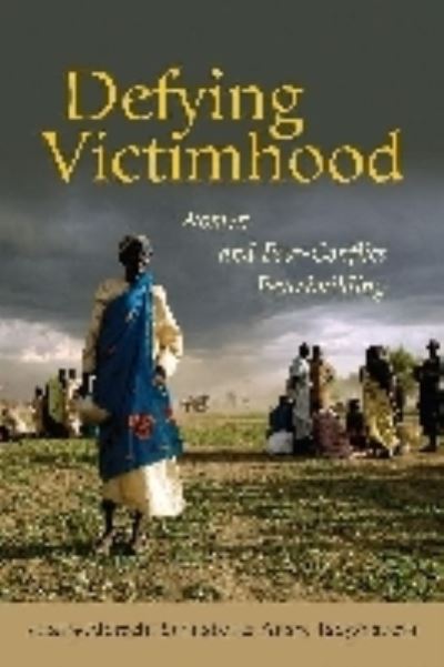 Cover for United Nations University · Defying victimhood: women and post-conflict peacebuilding (Paperback Book) (2012)