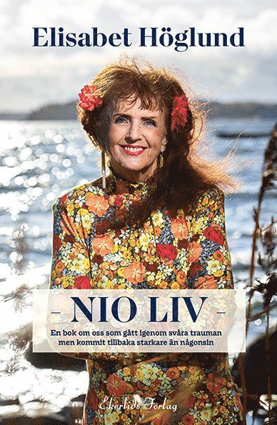 Cover for Elisabet Höglund · Nio liv : att övervinna livshotande trauman (Inbunden Bok) (2021)