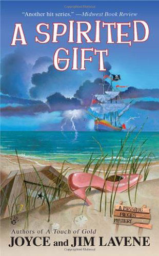 Cover for Joyce and Jim Lavene · A Spirited Gift (A Missing Pieces Mystery) (Paperback Book) (2011)