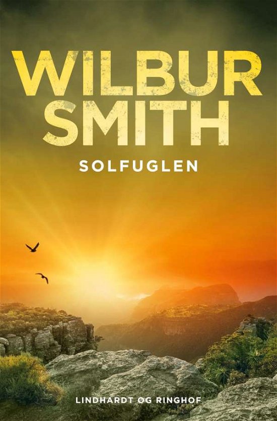 Cover for Wilbur Smith · Solfuglen (Sewn Spine Book) [1st edition] (2022)