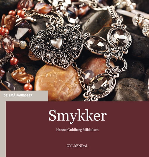 Cover for Hanne Guldberg Mikkelsen · De små fagbøger: Smykker (Sewn Spine Book) [1e uitgave] (2015)