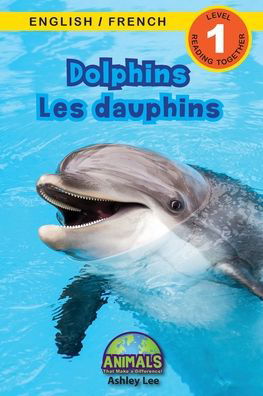 Cover for Ashley Lee · Dolphins / Les dauphins: Bilingual (English / French) (Anglais / Francais) Animals That Make a Difference! (Engaging Readers, Level 1) - Animals That Make a Difference! Bilingual (English / French) (Anglais / Francais) (Paperback Bog) [Large type / large print edition] (2021)