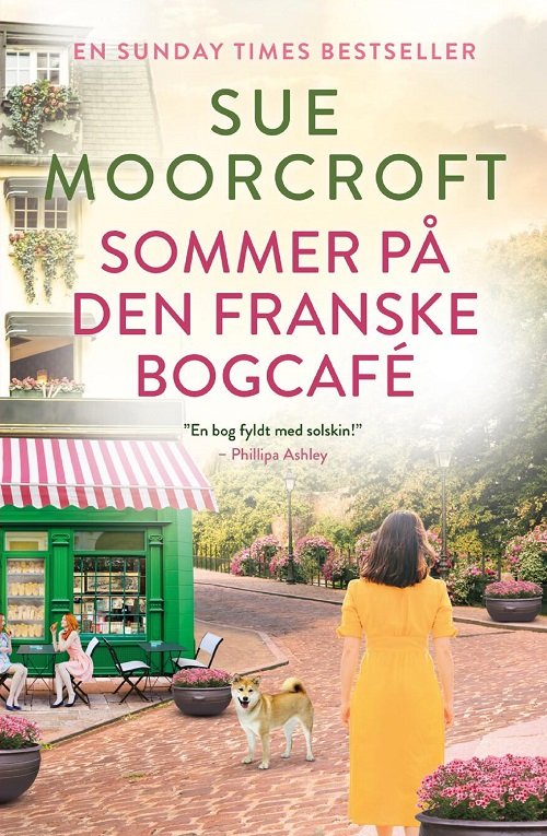 Cover for Sue Moorcroft · Sommer på den franske bogcafé (Hæftet bog) [1. udgave] (2023)