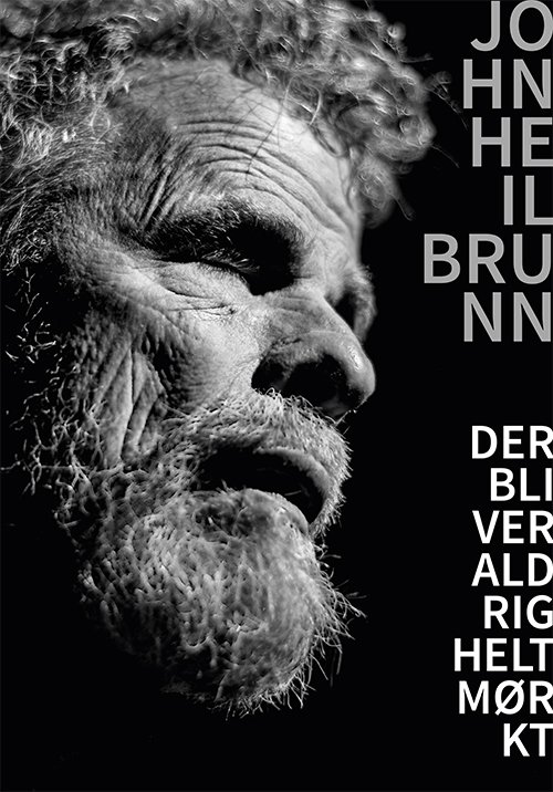 Cover for John Heilbrunn · Der bliver aldrig helt mørkt (Sewn Spine Book) [1º edição] (2023)