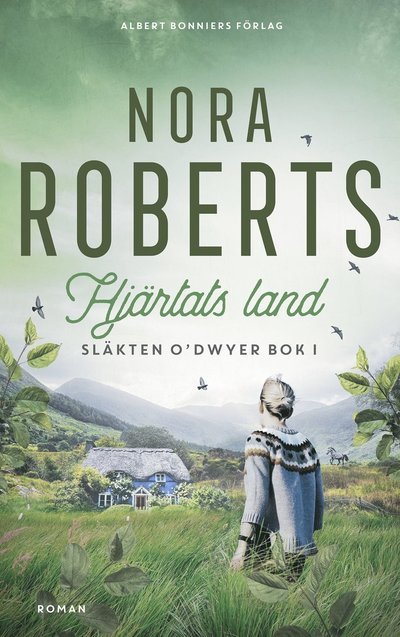 Cover for Nora Roberts · Hjärtats land (Gebundesens Buch) (2022)