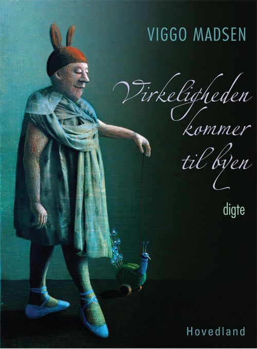 Cover for Viggo Madsen · Virkeligheden kommer til byen (Hæftet bog) [1. udgave] (2009)