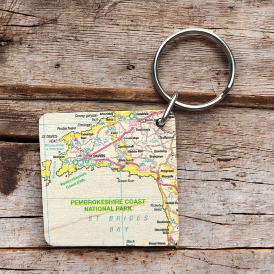 Cover for OS Map Wooden Square Key-ring - Pembrokeshire Coast National Park (MERCH) (2025)