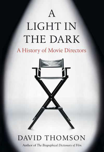 Cover for David Thomson · A Light in the Dark: A History of Movie Directors (Innbunden bok) (2021)