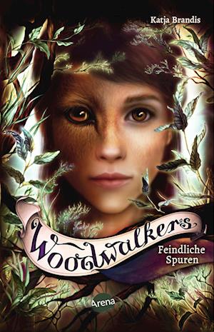 Woodwalkers (5). Feindliche Spuren - Katja Brandis - Bücher - Arena - 9783401512167 - 15. Juni 2023