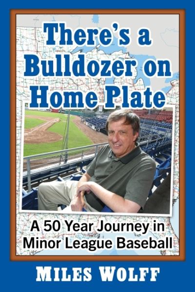 Cover for Miles Wolff · There's a Bulldozer on Home Plate: A 50-Year Journey in Minor League Baseball (Paperback Book) (2023)