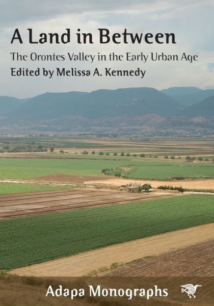 Cover for Melissa A. Kennedy · A Land in Between: The Orontes Valley in the Early Urban Age - Adapa Monographs (Paperback Book) (2020)