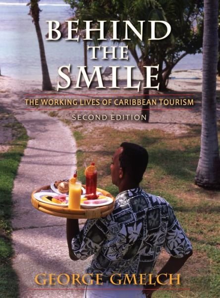 Cover for George Gmelch · Behind the Smile, Second Edition: The Working Lives of Caribbean Tourism (Paperback Book) [2 New edition] (2012)