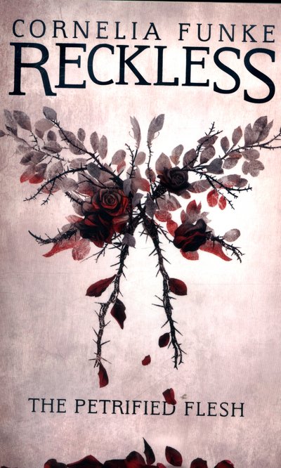 Cover for Cornelia Funke · Reckless I: The Petrified Flesh - The Mirrorworld Series (Paperback Bog) (2016)
