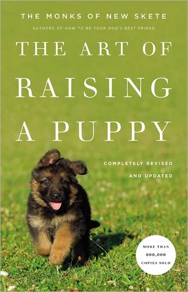Cover for Monks Of New Skete · The Art Of Raising A Puppy: Revised and Updated (Hardcover Book) [Revised and Updated edition] (2011)