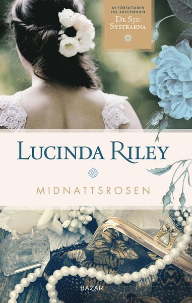 Cover for Lucinda Riley · Midnattsrosen (Paperback Bog) (2020)