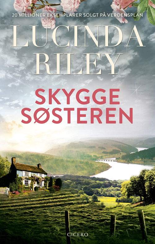 Cover for Lucinda Riley · Skyggesøsteren - new look (Paperback Book) [3º edição] (2019)