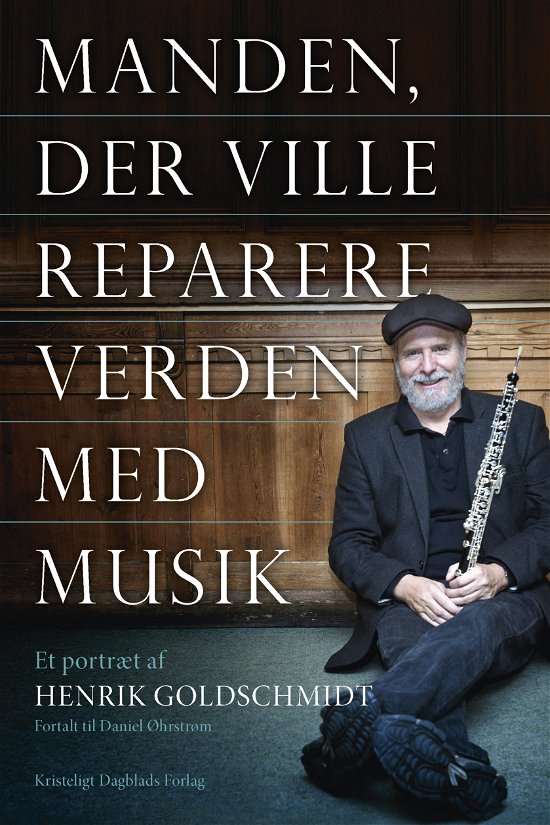 Cover for Daniel Øhrstrøm Henrik Goldschmidt · Manden der ville reparere verden med musik (Sewn Spine Book) [1st edition] (2019)