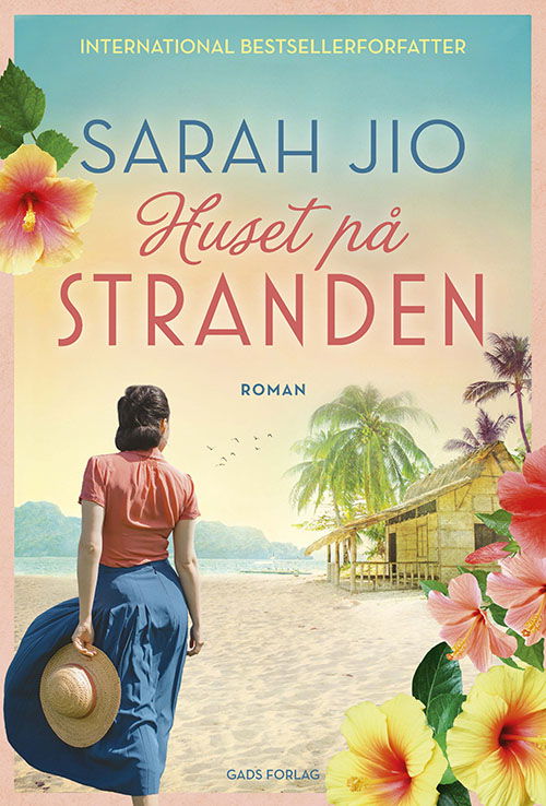 Cover for Sarah Jio · Huset på stranden (Heftet bok) [1. utgave] (2023)