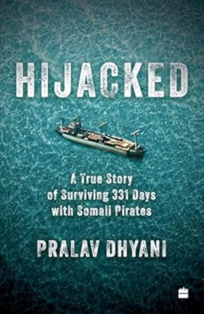 Cover for Pralav Dhyani · Hijacked: A True Story of Surviving 331 Days with Somali Pirates (Paperback Bog) (2025)