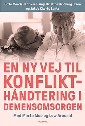 Gitte Mørch Henriksen; Anja Kristine Hvidberg Olsen; Jakob Kjærby Lentz · En ny vej til konflikthåndtering i demensomsorgen (Sewn Spine Book) [1º edição] (2022)