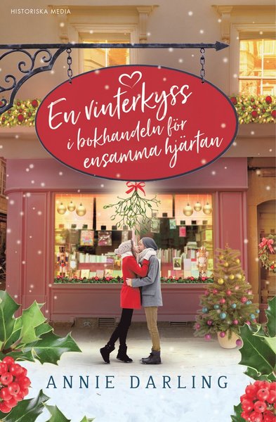 Cover for Annie Darling · Bokhandeln för ensamma hjärtan: En vinterkyss i bokhandeln för ensamma hjärtan (Indbundet Bog) (2021)