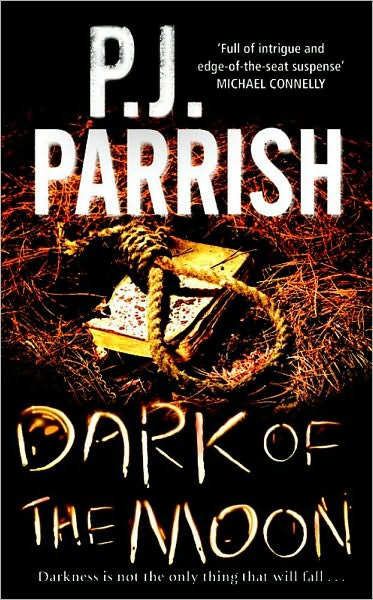 Cover for PJ Parrish · Dark of the Moon (Paperback Book) (2009)