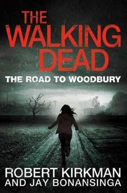 Cover for Robert Kirkman · The Road to Woodbury - The Walking Dead (Paperback Bog) [Main Market edition] (2012)