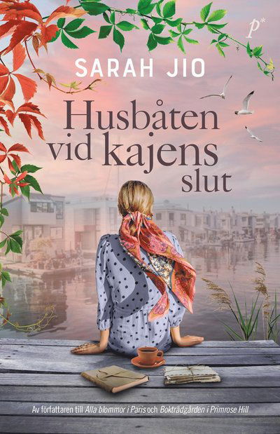 Cover for Sarah Jio · Husbåten vid kajens slut (Bound Book) (2023)