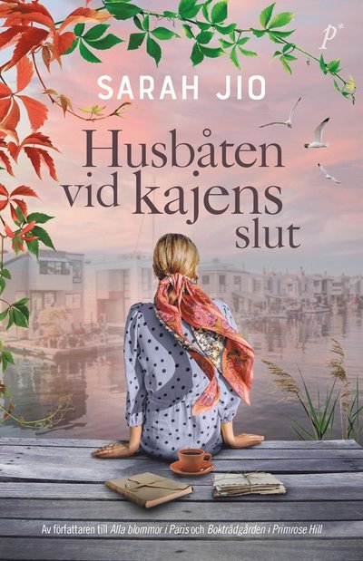 Cover for Sarah Jio · Husbåten vid kajens slut (Indbundet Bog) (2023)