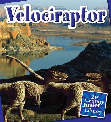 Cover for Lucia Raatma · Velociraptor (21st Century Junior Library: Dinosaurs) (Paperback Book) (2012)