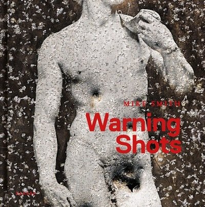 Cover for Smith · Warning Shots (Hardcover bog) (2020)