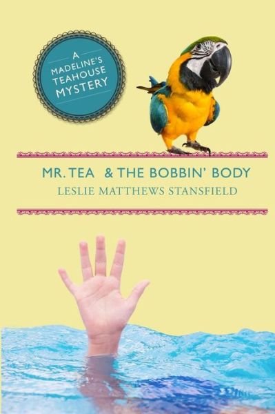 Cover for Leslie Matthews Stansfield · Mr. Tea and the Bobbin' Body: a Madeline's Teahouse Mystery (Paperback Book) (2014)