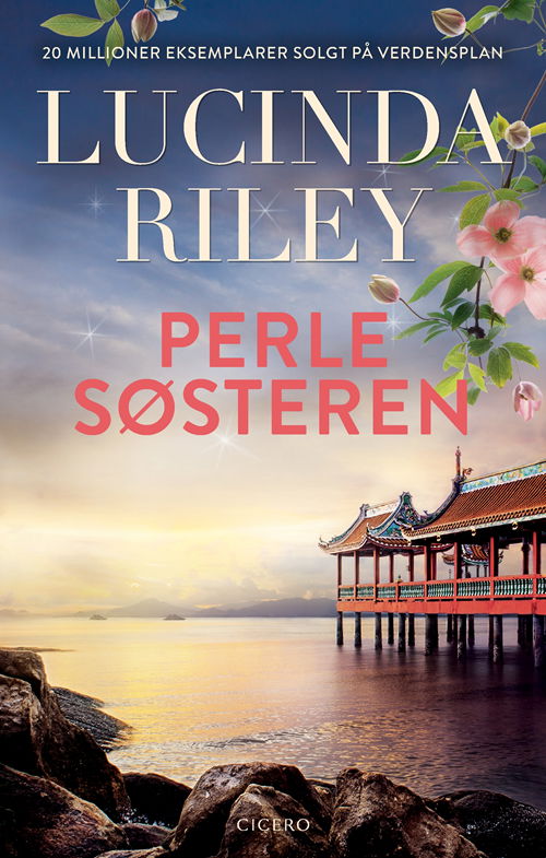 Cover for Lucinda Riley · Perlesøsteren - new look (Paperback Book) [3º edição] (2020)