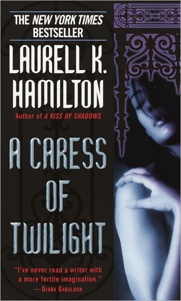 Cover for Laurell K. Hamilton · A Caress of Twilight (Meredith Gentry, Book 2) (Taschenbuch) [Reissue edition] (2003)