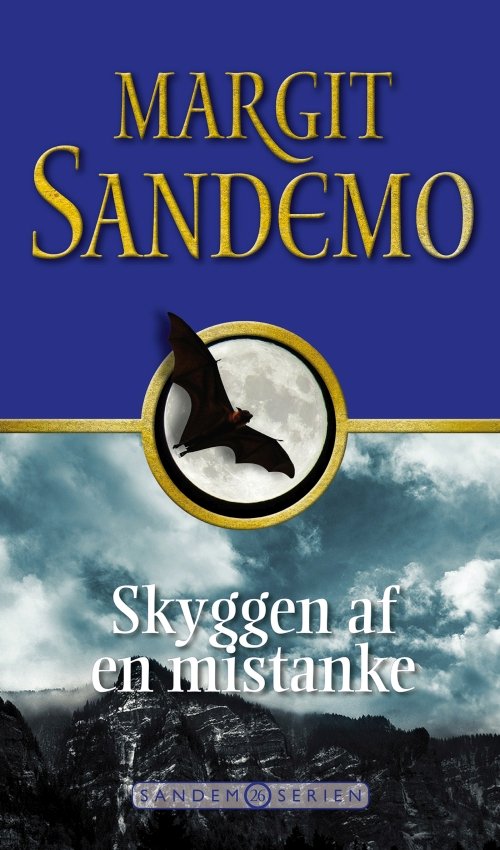 Sandemoserien: Sandemoserien 26 - Skyggen af en mistanke - Margit Sandemo - Kirjat - Jentas A/S - 9788776778439 - maanantai 9. huhtikuuta 2018
