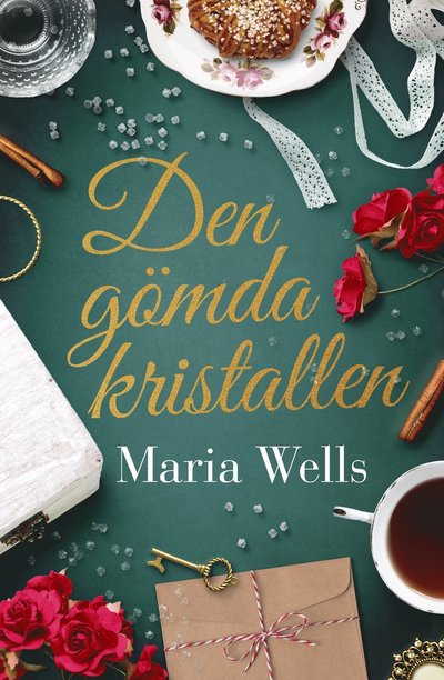 Cover for Maria Wells · Den gömda kristallen (Inbunden Bok) (2022)