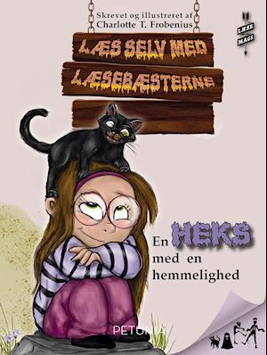 Cover for Charlotte T. Frobenius · LæseBæsterne: En heks med en hemmelighed (Sewn Spine Book) [1st edition] (2021)