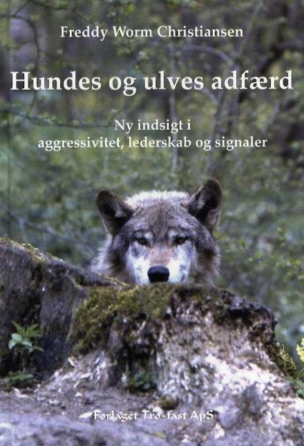 Cover for Freddy Worm Christiansen · Hundes og ulves adfærd (Bound Book) [1º edição] (2007)