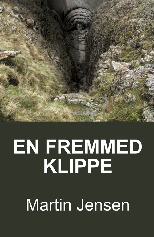 Cover for Martin Jensen · En Fremmed Klippe (Storskrift) (Hæftet bog) (2014)