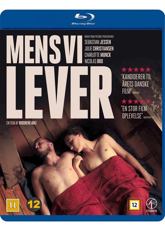 Mens Vi Lever -  - Elokuva -  - 7333018010512 - torstai 8. maaliskuuta 2018
