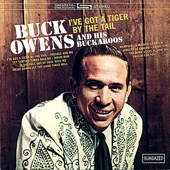 Cover for Buck Owens · I've Got A Tiger By The Tail (LP) [Black Friday 2024 Orange Vinyl edition] (2024)