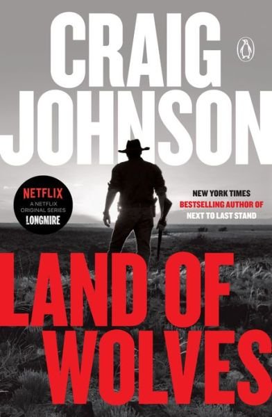 Cover for Craig Johnson · Land of Wolves: A Longmire Mystery - A Longmire Mystery (Paperback Book) (2020)