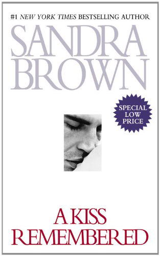 Cover for Sandra Brown · A Kiss Remembered (Paperback Book) [Reprint edition] (2012)