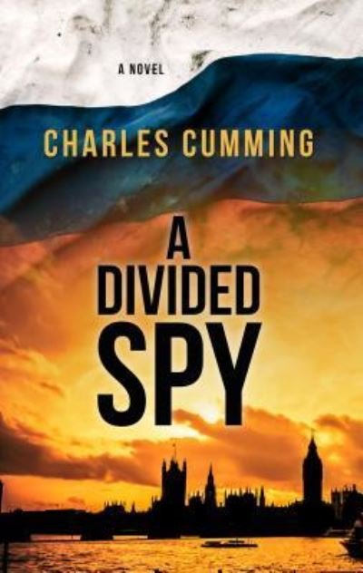Cover for Charles Cumming · A divided spy (Bok) [Large print edition. edition] (2017)
