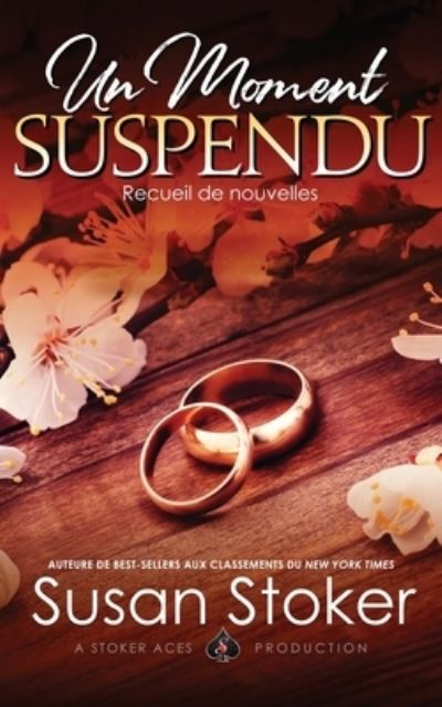 Un moment suspendu - Susan Stoker - Books - Stoker Aces Production - 9781644992586 - February 1, 2022