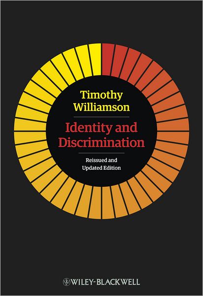 Cover for Williamson, Timothy (Oxford University, UK) · Identity and Discrimination (Paperback Book) [Reissued and Updated edition] (2013)