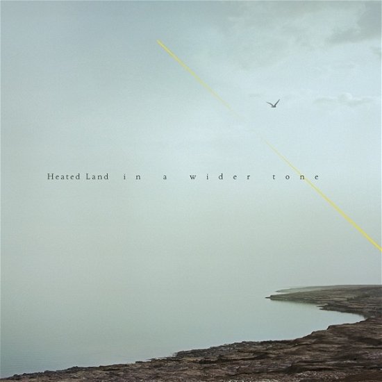 Cover for Heated Land · In A Wider Tone (LP) (2019)